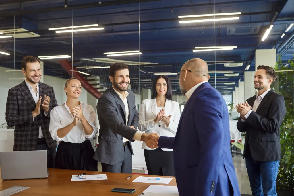 Business people shaking hands on meeting in conference room